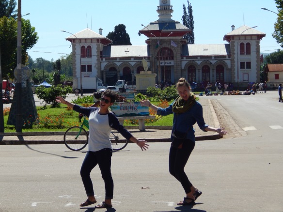 Excited for our first day of vacation, posing in front of the train station in Antsirabe